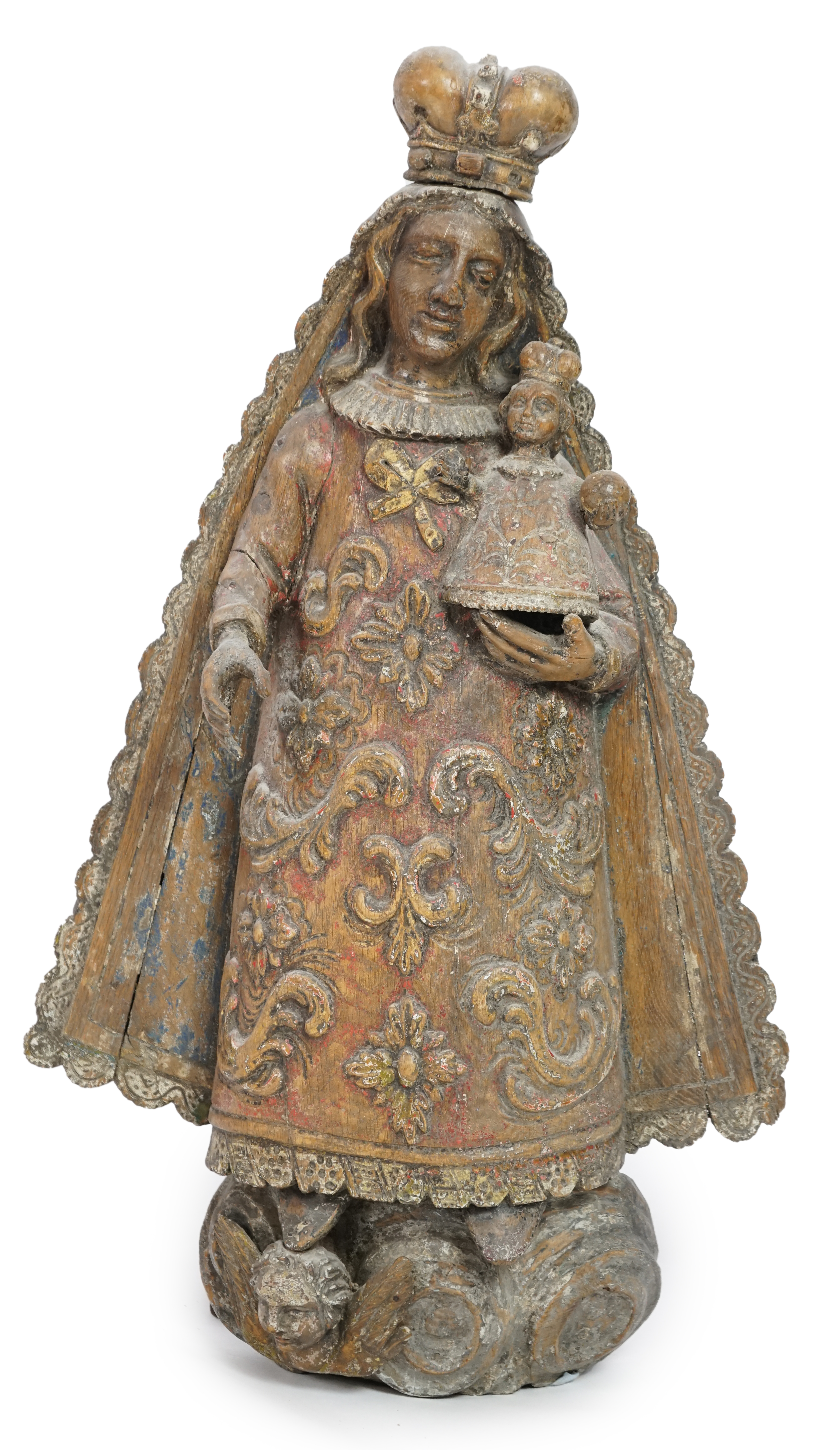 A late 18th century Spanish polychrome oak group of the Madonna and child